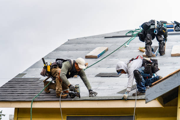 Professional Roofing technician working in Victor, CA